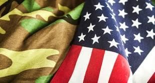 A close up of the american flag and camouflage